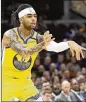  ?? TONY DEJAK / AP ?? Guard D’Angelo Russell sat out Monday because the Warriors didn’t want to risk an injury before the trade deadline.