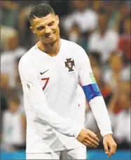  ?? Jonathan Nackstrand / AFP/Getty Images ?? Portugal’s Cristiano Ronaldo reacts during Saturday’s loss to Uruguay.