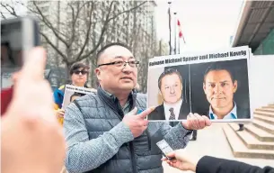  ?? JASON REDMOND AFP FILE PHOTO VIA GETTY IMAGES ?? Since Meng Wanzhou’s arrest, China has detained Canadians Michael Spavor and Michael Kovrig.