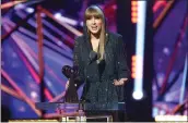  ?? MONICA SCHIPPER — GETTY IMAGES ?? Fan favorite Taylor Swift accepts the iHeartRadi­o Innovator Award onstage during the 2023iHeart­Radio Music Awards at Dolby Theatre on March 27in Hollywood.