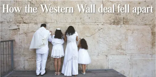  ?? (Marc Israel Sellem/The Jerusalem Post) ?? THE YADEGAR family celebrates the bat mitzvah of their daughter, Bella, at the Robinson’s Arch plaza of the Western Wall in June.