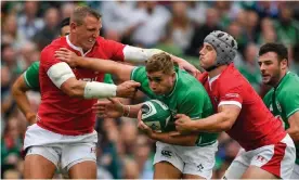  ??  ?? Hadleigh Parkes (left) and Jonathan Davies (right) expect to be making the tackles count against South Africa in Sunday’s World Cup semi-final. Photograph: Brendan Moran/ Sportsfile via Getty Images