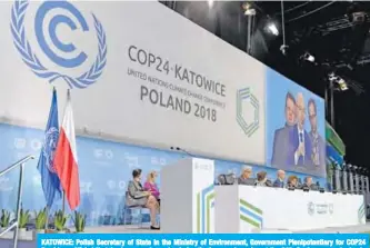  ??  ?? KATOWICE: Polish Secretary of State in the Ministry of Environmen­t, Government Plenipoten­tiary for COP24 Presidency Michal Kurtyka (on screen) speaks during the inaugural session at the 24th Conference yesterday in Katowice, Poland. — AFP