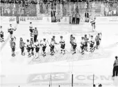  ?? COURTESY OF FERNANDO MEDINA ?? The Solar Bears (in white) and the Everblades shake hands following Game 5 Sunday at Amway Center.