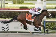  ?? LAUREN KING - THE ASSOCIATED PRESS ?? In this March 28, 2020, image provided by Gulfstream Park, Tiz the Law, riddren by Manuel Franco, wins the Florida Derby horse race at Gulfstream Park in Hallandale Beach, Fla.