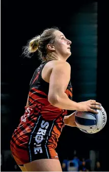  ?? PHOTO: PHOTOSPORT ?? Tactix shooter Ellie Bird has risen to stardom for the team this season despite developing her game at a late age.