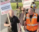  ?? INTERNATIO­NAL BROTHERHOO­D OF TEAMSTERS ?? Teamsters General President Sean O’Brien (left) joins strikers on a picket line Friday outside Breakthru Beverage Group In Cicero.