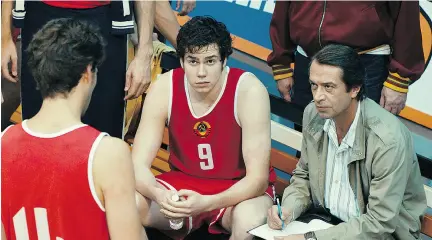  ?? CENTRAL PARTNERSHI­P VIA THE ASSOCIATED PRESS ?? Actors Kuzma Saprykin and Vladimir Mashkov star in the Russian film Going Vertical, which explores the Soviets’ 1972 men’s basketball Olympic gold medal win, but none of the controvers­y that followed.