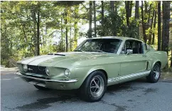  ?? CLAYTON SEAMS / DRIVING. CA ?? Battle of the 1967 2+2s. The Porsche 911S, left, and the Shelby- designed Mustang GT500, right.