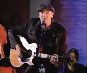  ??  ?? In this file photo, musician James Taylor performs in Manchester, New Hampshire. — AP Photos