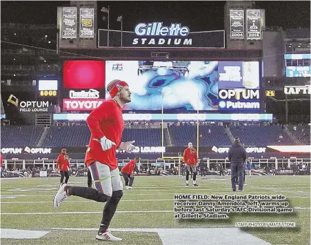  ?? STAFF PHOTO BY MATT STONE ?? HOME FIELD: New England Patriots wide receiver Danny Amendola, left, warms up before last Saturday’s AFC Divisional game at Gillette Stadium.