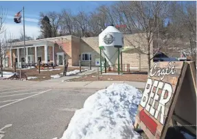  ?? MICHAEL SEARS/USA TODAY NETWORK - WISCONSIN ?? Adam Draeger establishe­d the Inventors BrewPub inside the American Legion Post 82 in Port Washington, where he rents space. He serves beer in the front and brews it in a small area at the rear of the building.