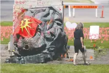  ?? CHRIS PROCAYLO ?? The statue of Queen Victoria at the Manitoba Legislatur­e in Winnipeg was toppled on Canada Day. Its head was removed.