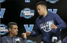  ?? ELISE AMENDOLA — THE ASSOCIATED PRESS ?? Villanova basketball coach Jay Wright, left, and guard Jalen Brunson fist-bump after a news conference at an NCAA men’s college basketball tournament regional Saturday in Boston.