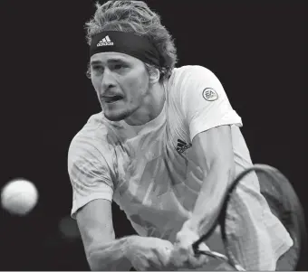  ?? THIBAULT CAMUS/ AP PHOTO ?? Germany’s Alexander Zverev returns the ball during his straight set victory over Spain’s Rafael Nadal during their semifinal match at the Paris Masters tennis tournament on Saturday.