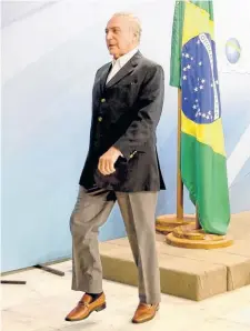  ?? NA ?? Temer deja el salón tras dar sus explicacio­nes.