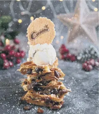  ?? ?? A veritable tower of a Mince Pie Waffle has been launched by Creams Café