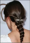  ??  ?? Demure: Her braided hair