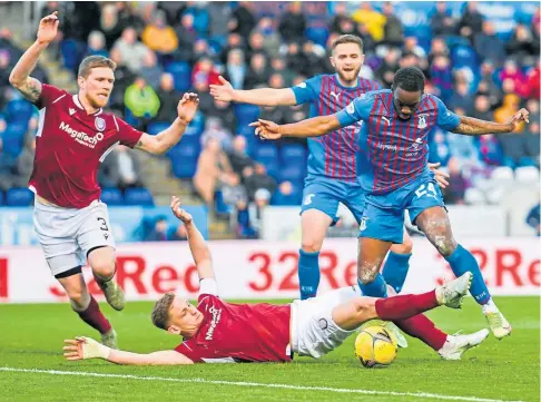  ?? ?? THEY SHALL NOT PASS: Skipper Tam O’Brien was an immovable force in the Arbroath defence all season.