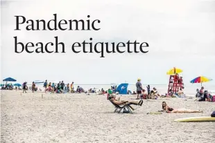  ?? PATRICK CONNOLLY/ORLANDO SENTINEL ?? Cocoa Beach is open but enforcing social distancing and requiring groups of fewer than 10 people.