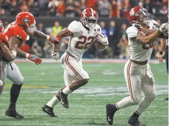  ?? Icon Sportswire / Icon Sportswire via Getty Images ?? Harris had six carries for 64 yards in Alabama’s 26-23 win over Georgia in last season’s national-title game. For the season, he had 61 carries for 370 yards, a 6.1-yard average.