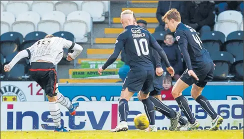  ??  ?? Rory Loy pulls one back for St Mirren but it wasn’t enough for Jack Ross’s men as they slipped to a 2-1 defeat against Falkirk