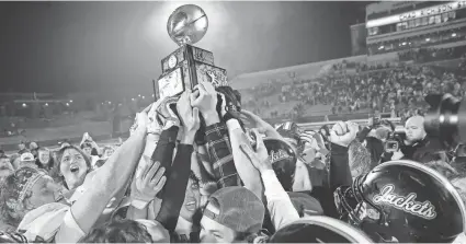  ?? BRYAN TERRY/THE OKLAHOMAN ?? Fairview celebrates after the Class A state championsh­ip football game between the Fairview Yellowjack­ets and the Gore Pirates Chad Richison Stadium in Edmond in 2022. Fairview won 32-28.