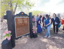  ?? ADOLPHE PIERRE-LOUIS/JOURNAL ?? A group gathers outside the Gutierrez-Hubbell House in Albuquerqu­e to unveil a new roadside historic marker honoring Josefa Baca and her role in the history of the South Valley.