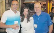  ??  ?? Simon Gagne, Sobeys’ chief human resources officer, Renee Hopfner, the company’s director of community investment and senior vice-president Andrew Walker are pictured at the registrati­on reception.