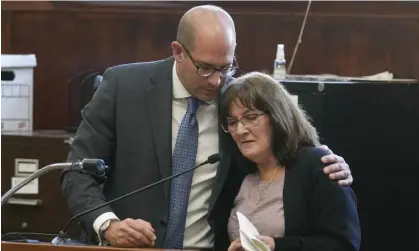  ?? Photograph: Seth Wenig/AP ?? The prosecutor Jared Rosenblatt comforts Darlene Altman, daughter of Diane Cusick, as she readsa statement at a courtroom in Mineola, New York, on Monday.