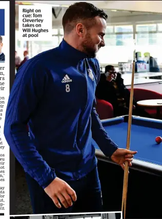  ??  ?? Right on cue: Tom Cleverley takes on Will Hughes at pool