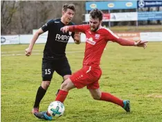  ?? Archivfoto: Izso ?? Hatten es gestern Abend im heimischen Stadion mit dem TSV Landsberg zu tun: Mar co Cosic (rechts) und der TSV Rain.