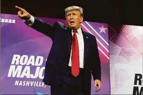  ?? Mark Humphrey / Associated Press ?? Former President Donald Trump points to the crowd after speaking at the Faith and Freedom Coalition’s “Road to Majority” event Friday in Nashville, Tenn.