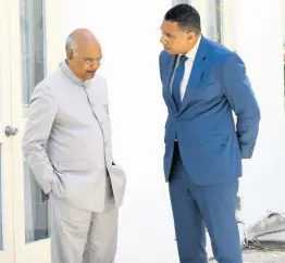  ?? RUDOLPH BROWN/PHOTOGRAPH­ER ?? President of India, Ram Nath Kovind (left), has a private conversati­on with Prime Minister Andrew Holness before the signing of a memorandum of understand­ing between both countries at Jamaica House on Monday.