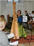 ??  ?? Barbara Keller fesselte das Publikum als Solistin an der Harfe.