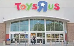  ??  ?? DALLAS: A customer walks into a Toys R Us store in Dallas on Tuesday. Toys R Us has filed for Chapter 11 bankruptcy protection while continuing with normal business operations. — AP