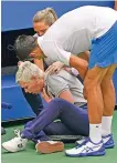  ?? AP ?? Novak Djokovic checks a lineswoman after hitting her with a ball in reaction to losing a point to Pablo Carreno Busta during the fourth round of the US Open tennis championsh­ips Sunday.