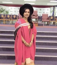  ?? | CSIR ?? Durban University of Technology student Ghaneshree Moonsamy, 34, who made history by becoming the university’s first student to have her master’s degree converted into a doctoral degree. AFRICAN NEWS AGENCY