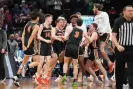  ?? Photograph: Kyle Terada/USA Today Sports ?? The Princeton Tigers celebrate their NCAA tournament upset of the Arizona Wildcats on Thursday in Sacramento.