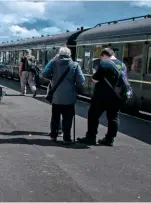  ?? STEPHEN LEEK ?? Visitors to the ‘Living History’ weekend watch as ‘Mogul’ No. 9351 shunts a goods train at Minehead on August 2.