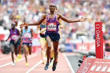  ??  ?? Britain’s Mo Farah wins the men’s 3000m during the IAAF Diamond League Anniversar­y Games athletics meeting at the Queen Elizabeth Olympic Park stadium in Stratford, east London on July 9, 2017. - AFP photo