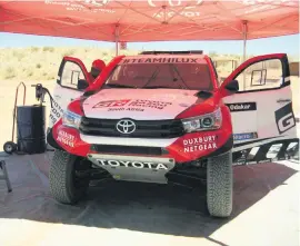  ??  ?? MEAN MACHINE. The Toyota Dakar bakkies are powered by four-litre V8 engines, and really haul over rough terrain.