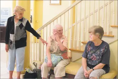  ?? Hearst Connecticu­t Meida file photo ?? Helen Matulavage, left, with two residents from the Callahan House senior housing in Seymour during the summer of 2011. Matulavage, whose daughter helped prompt state legislatio­n on housing complex violence, died in 2017.