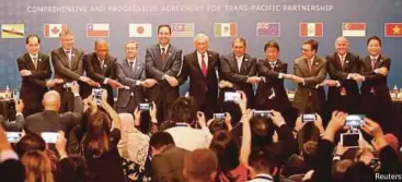  ?? REUTERS PIC ?? Moving on without the United States, the remaining 11 countries of the TransPacif­ic Partnershi­p had, on March 8, signed a new version of the multilater­al trade pact.