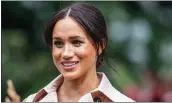  ?? MICHELE SPATARI — AFP VIA GETTY IMAGES ?? Meghan Markle acknowledg­es her challenges with adjusting to royal life in a recent British interview.
