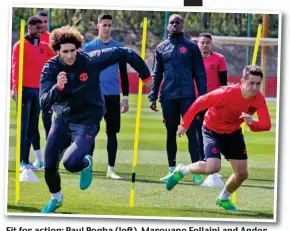  ??  ?? Fit for action: Paul Pogba (left), Marouane Fellaini and Ander Herrera (above) get stuck into training before flying to Spain
