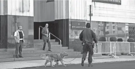  ?? KELLY JORDAN/DETROIT FREE PRESS ?? The federal courthouse in downtown Detroit. Prosecutor­s say a scheme involving secretly downloadin­g the department's police reports about vehicle crashes before the reports were publicly available amounted to fraud and theft.