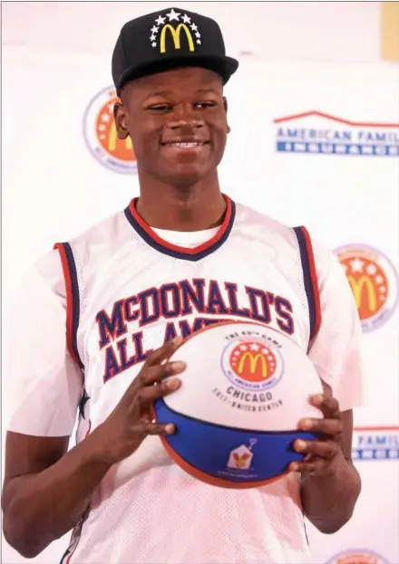  ?? PETE BANNAN — DIGITAL FIRST MEDIA FILE ?? Westtown School senior Mohamed Bamba holds a McDonald’s All-American basketball after being named to the McDonald’s All-American Game in January, 2017.