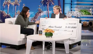  ?? — Photos: TNs ?? Kimball (left) receives a second us$10,000 (rm41,830) gift from deGeneres for her planned animal rescue.