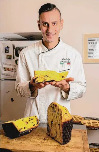  ?? Bread & Best Food Photograph­y/Contribute­d photo ?? Pierluigi Mazzella of Fatto a Mano, holds a slice of his handmade panettone.
